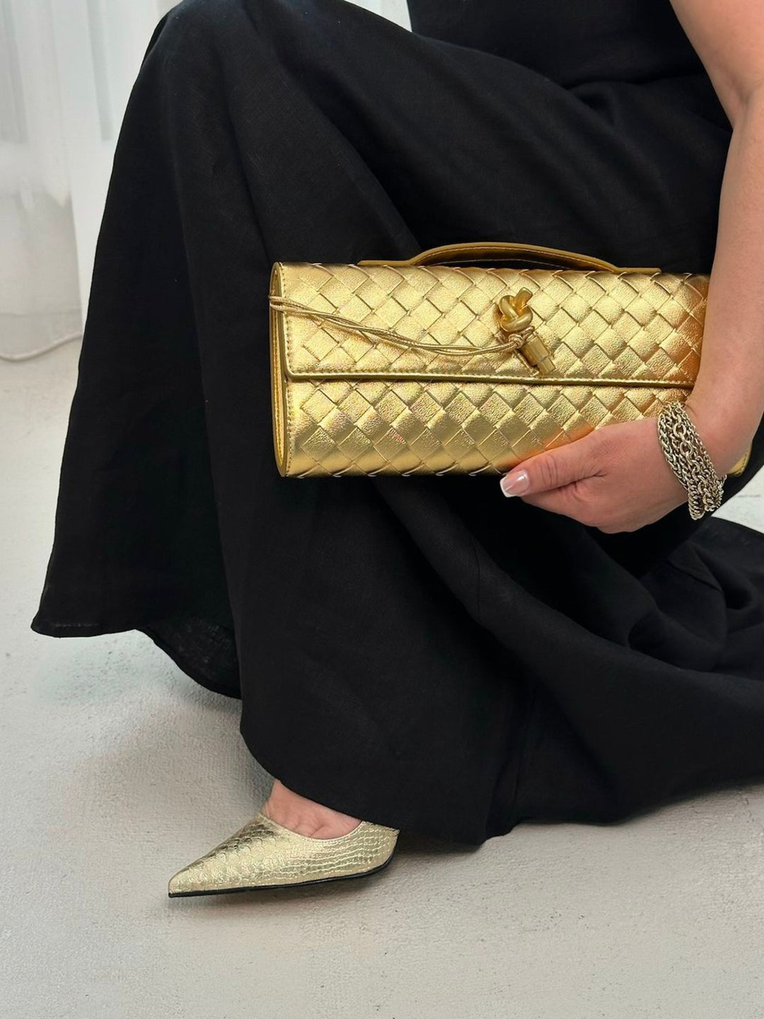 Anna™ Woven Clutch